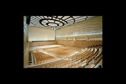The concert hall ceiling is made from panels of specially woven fabric less than 1mm thick, supported on a web of steel cables